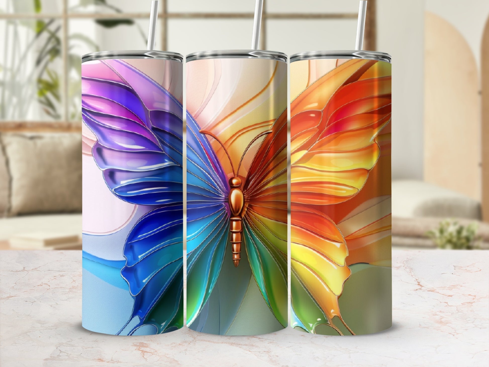 Three tall tumblers with iridescent butterfly wings design.