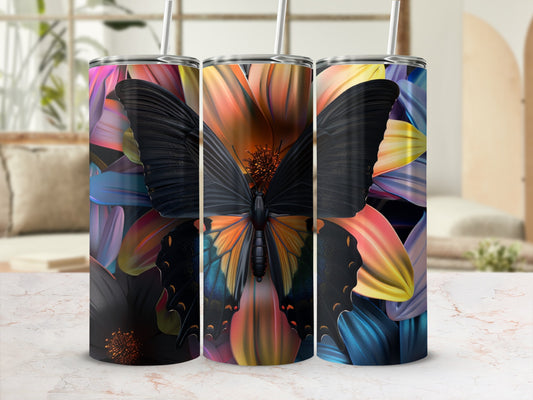 Tumbler with butterfly and floral design.