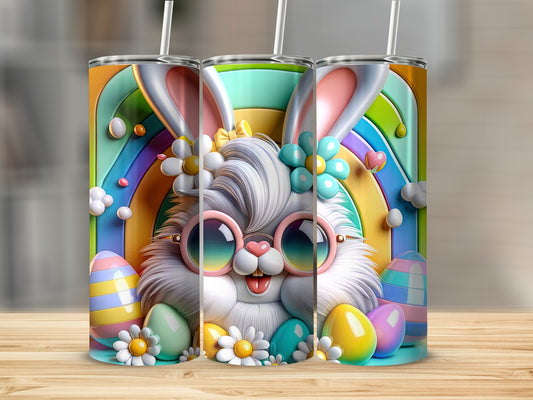Fuzzy bunny with sunglasses and rainbow background on three tumblers.