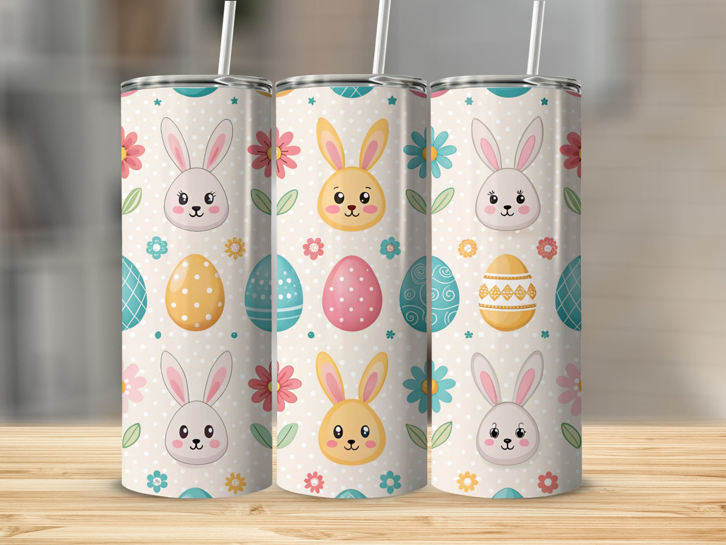 Three Easter-themed tumblers with bunnies, eggs, and flowers.