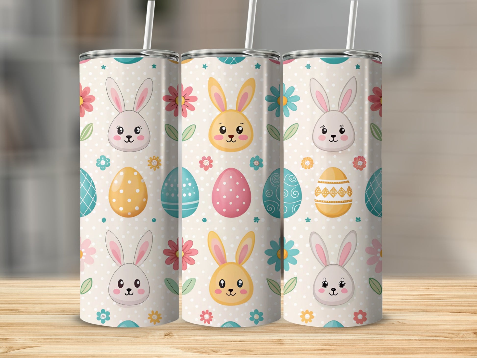 Three Easter-themed tumblers with bunnies, eggs, and flowers.