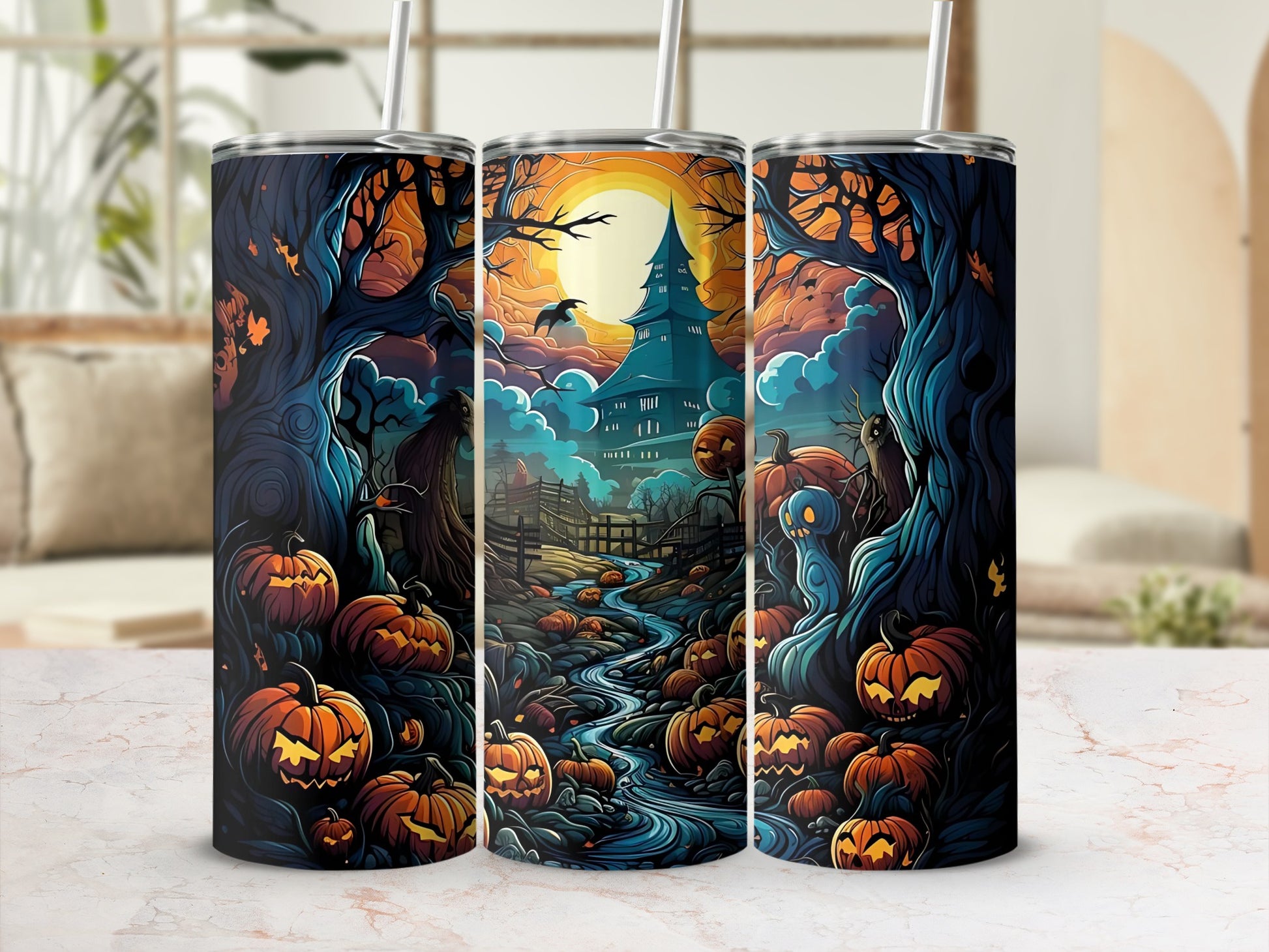 Halloween tumbler with haunted house, pumpkins, and spooky trees.