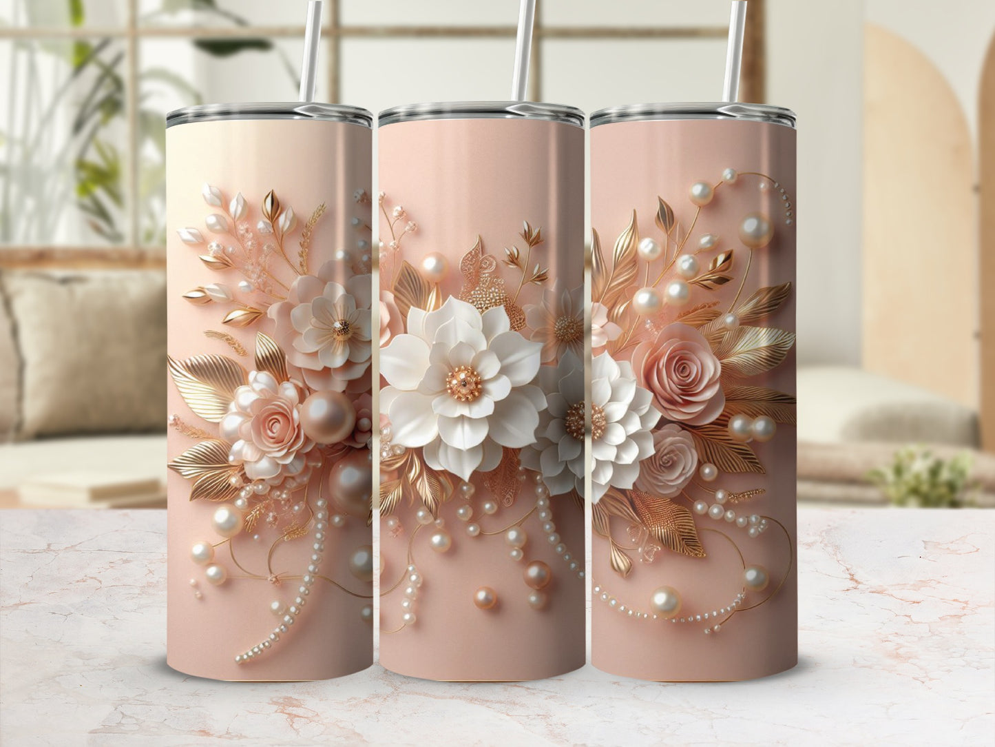 Three rose gold tumblers with delicate floral and pearl embellishments.