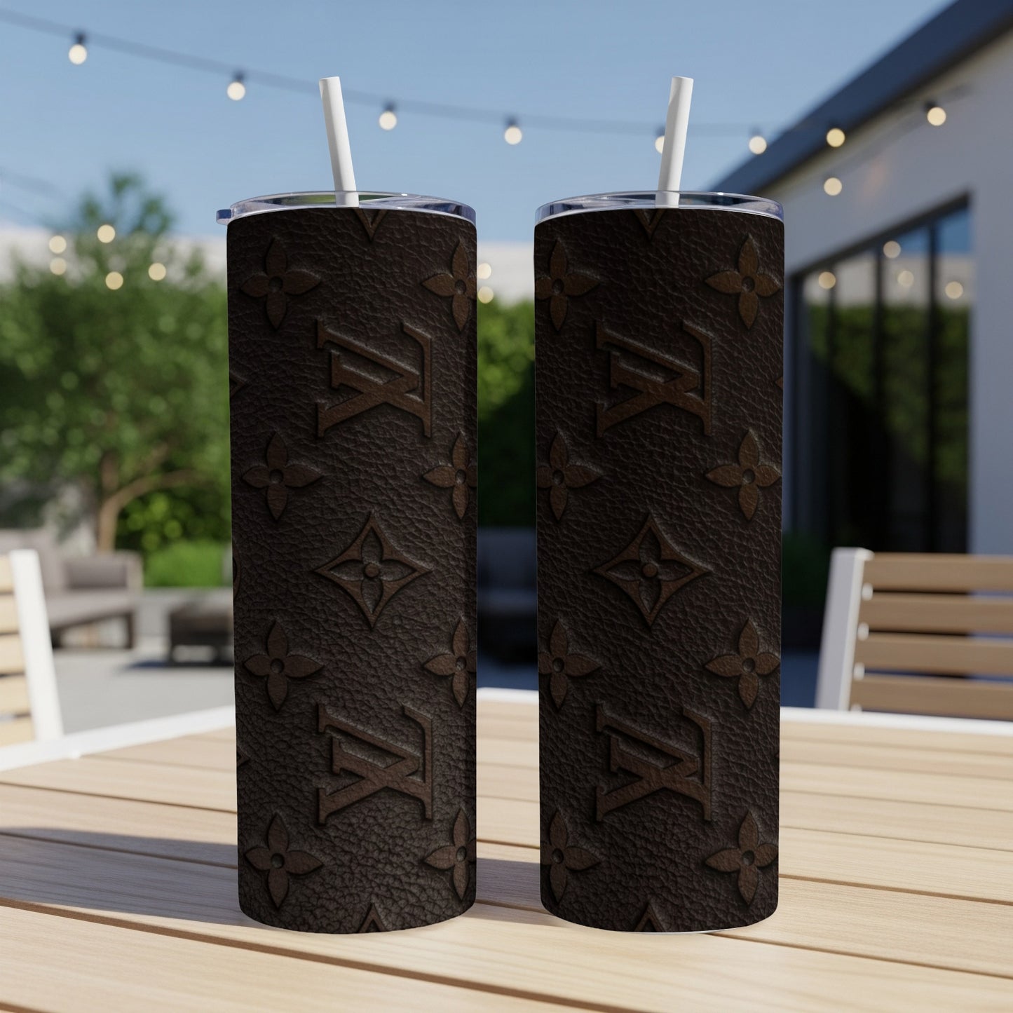 Brown tumbler with repeating LV monogram pattern.