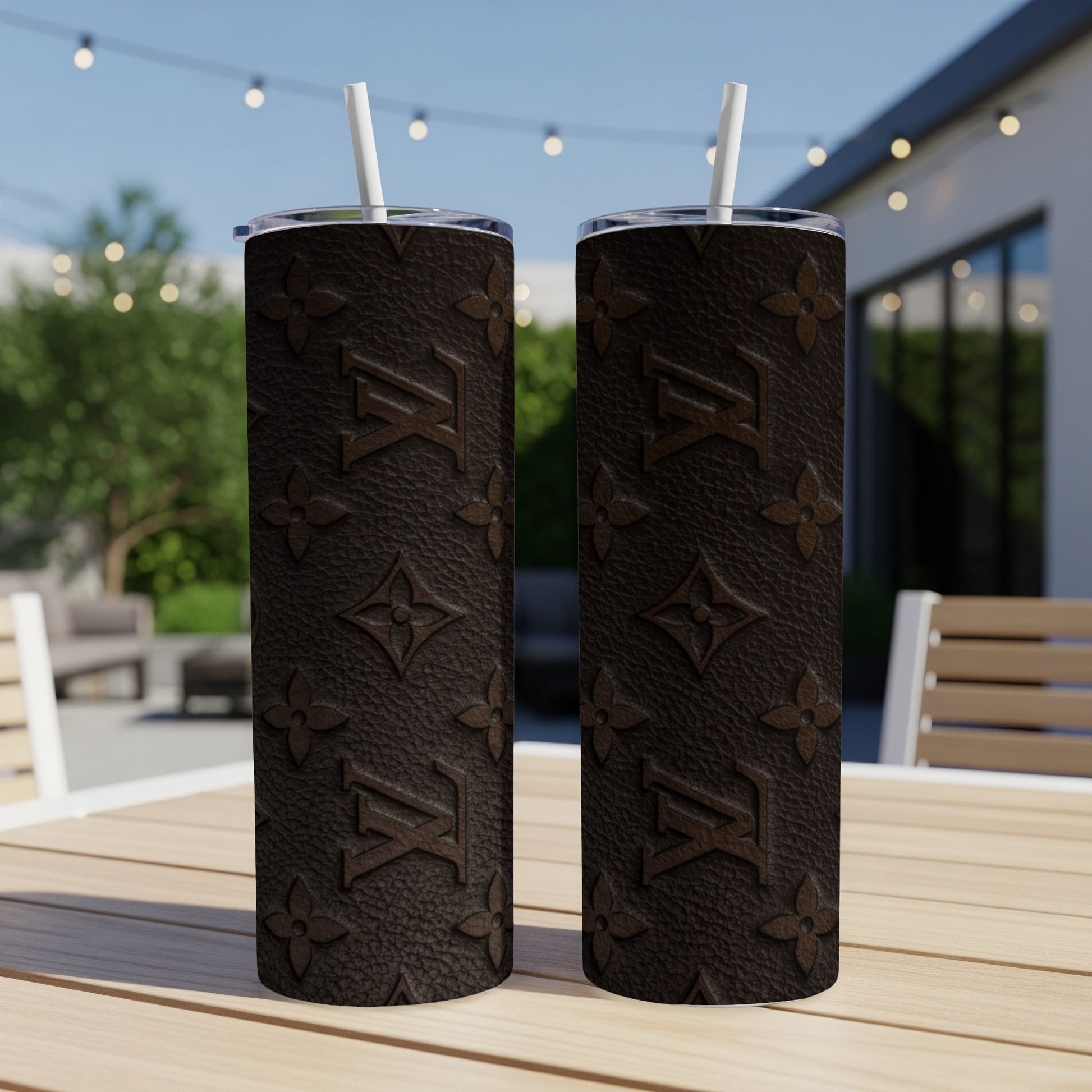 Brown tumbler with repeating LV monogram pattern.