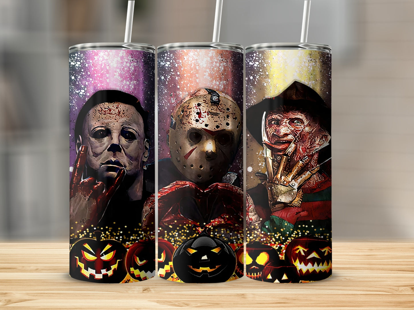 Three tumblers featuring horror characters Michael Myers, Jason Voorhees, and Freddy Krueger with pumpkins.