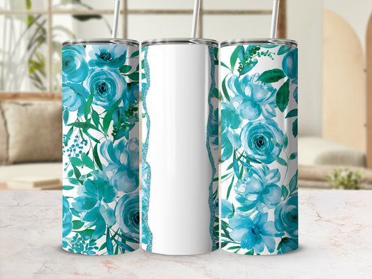 Three tall, white tumblers with blue floral watercolor designs and glitter accents.