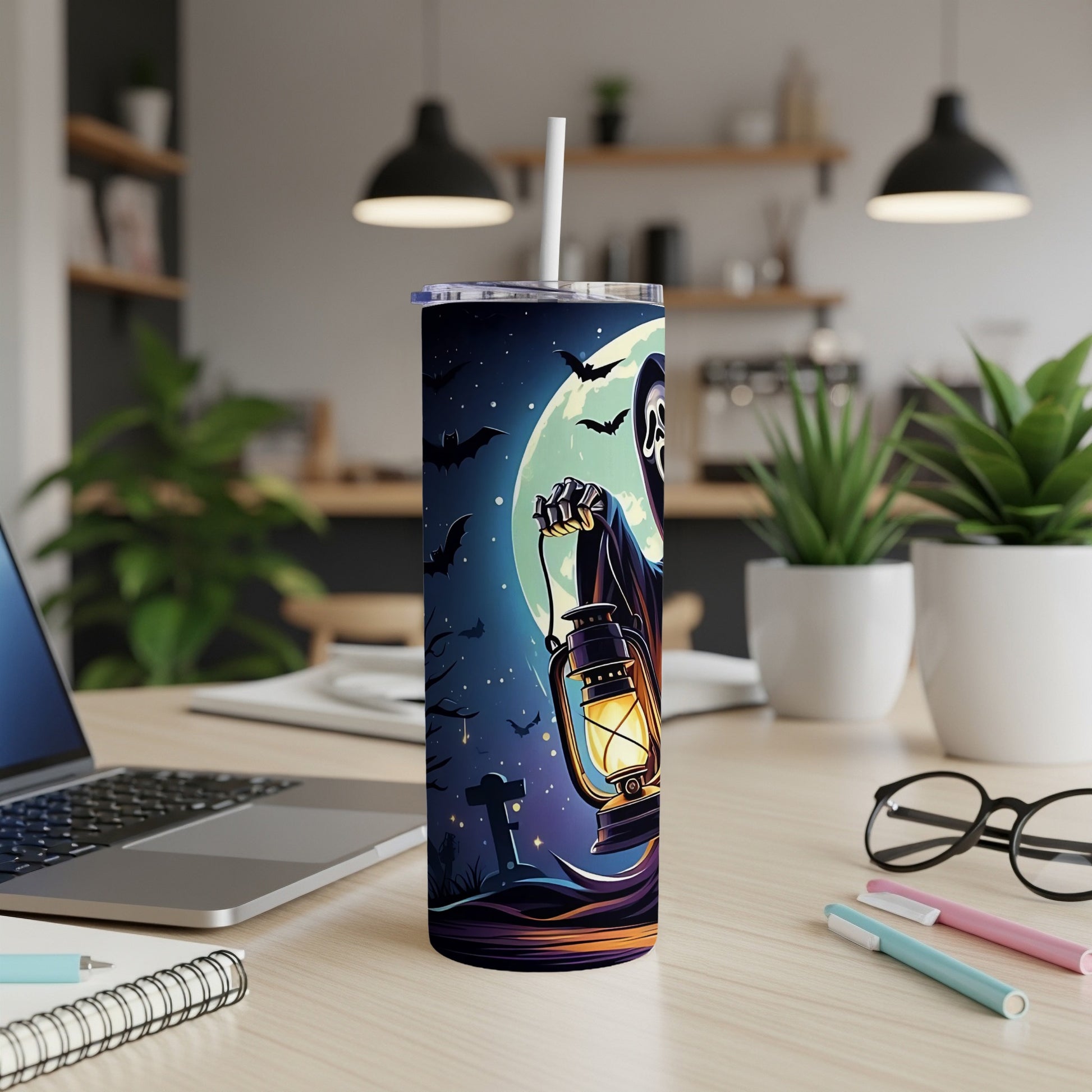 Tumbler with a grim reaper holding a lantern on a spooky moonlit background.