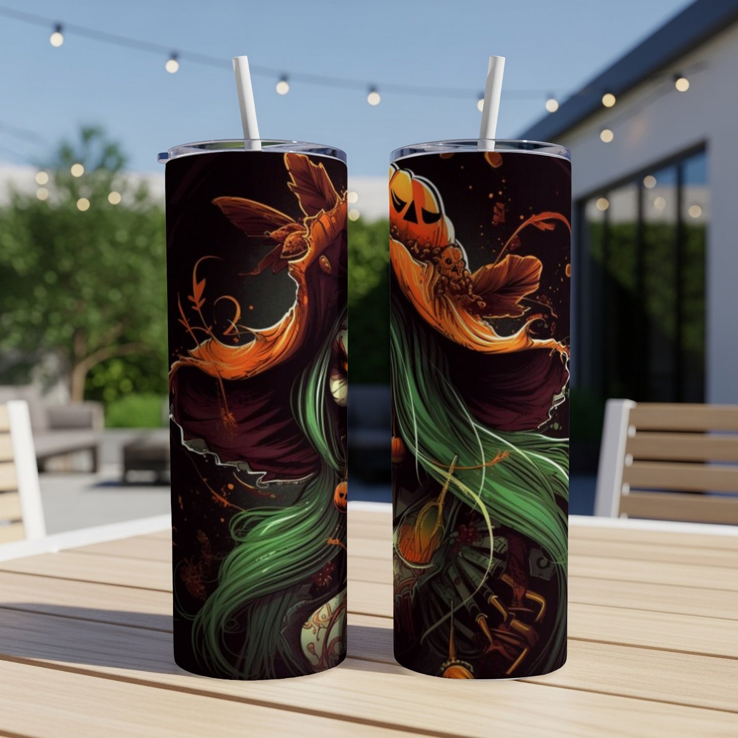Two tumblers with a dark Halloween design featuring a witch and pumpkins.