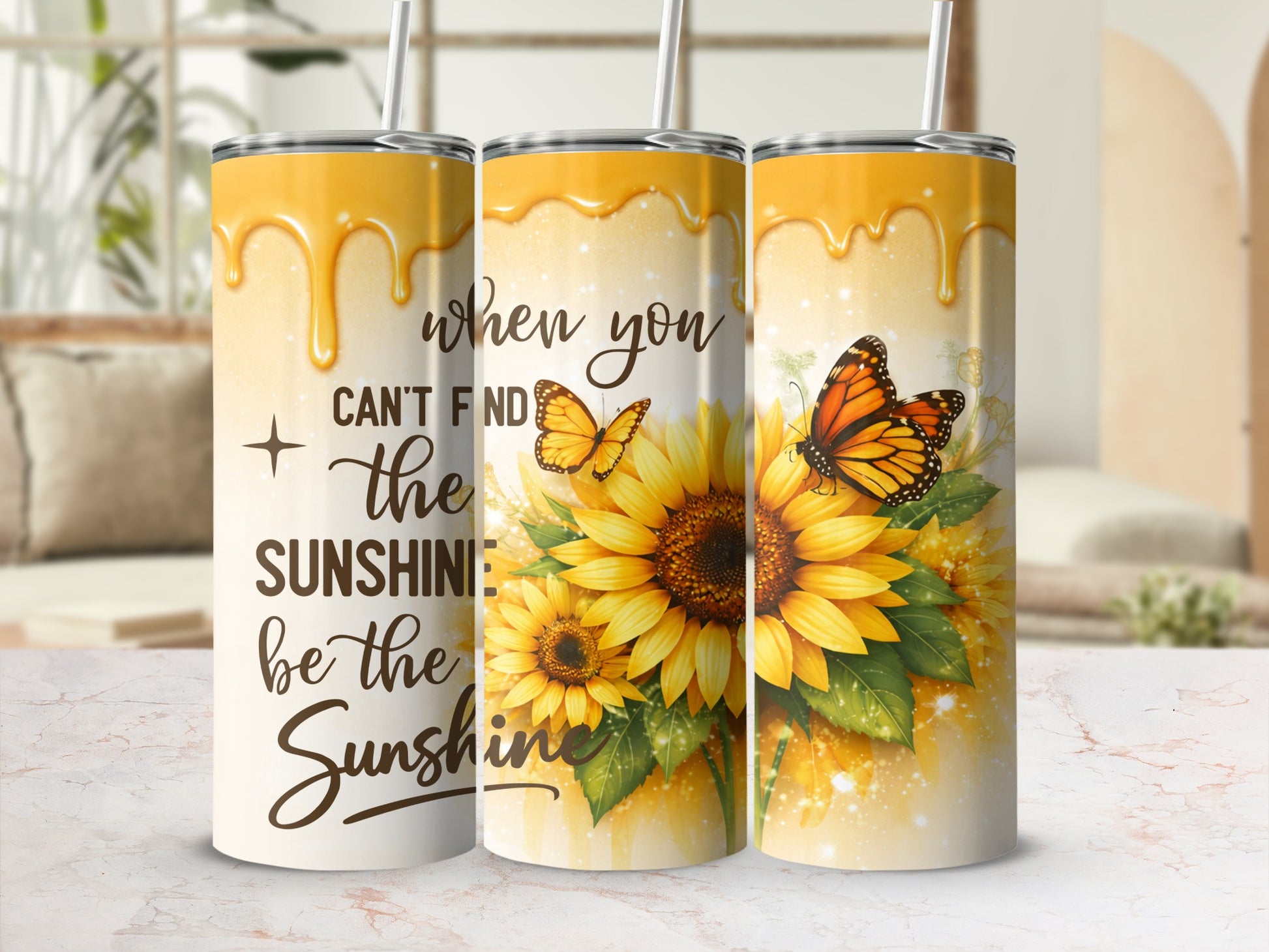 Tumblers with sunflowers, butterflies, and the quote "When you can't find the sunshine, be the sunshine."