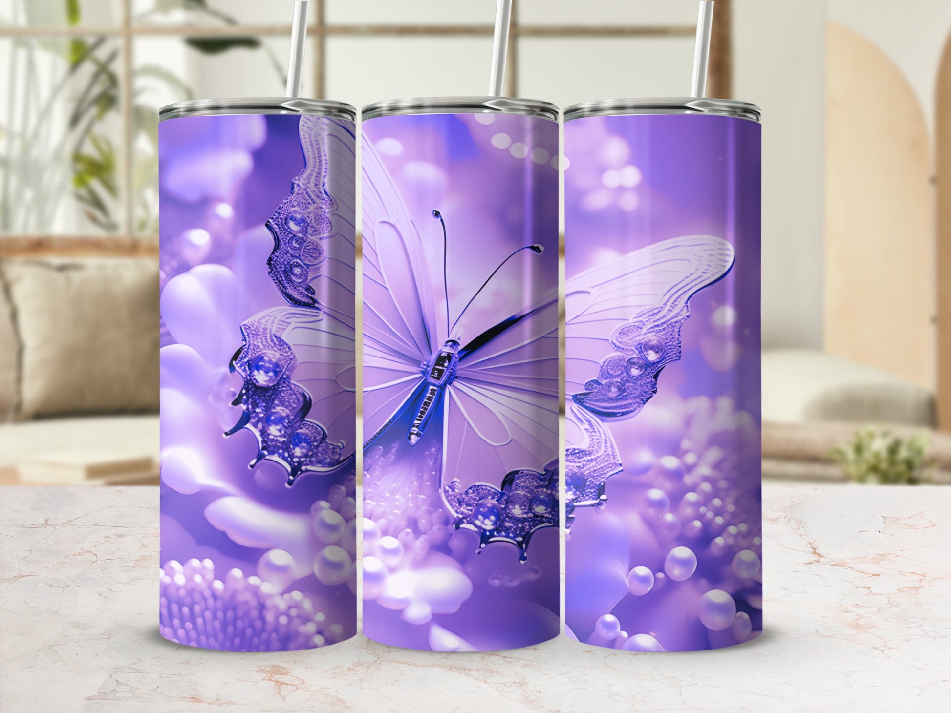 Purple butterfly design on three tumblers with floral and pearl accents.