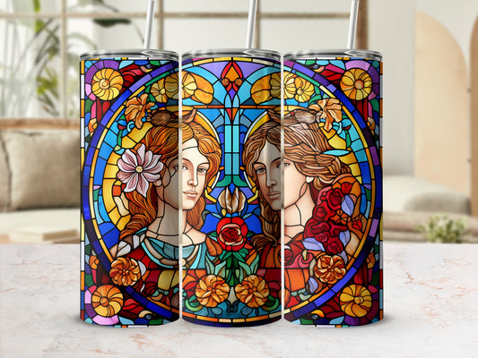 Two Gemini twins surrounded by stained glass floral motifs.