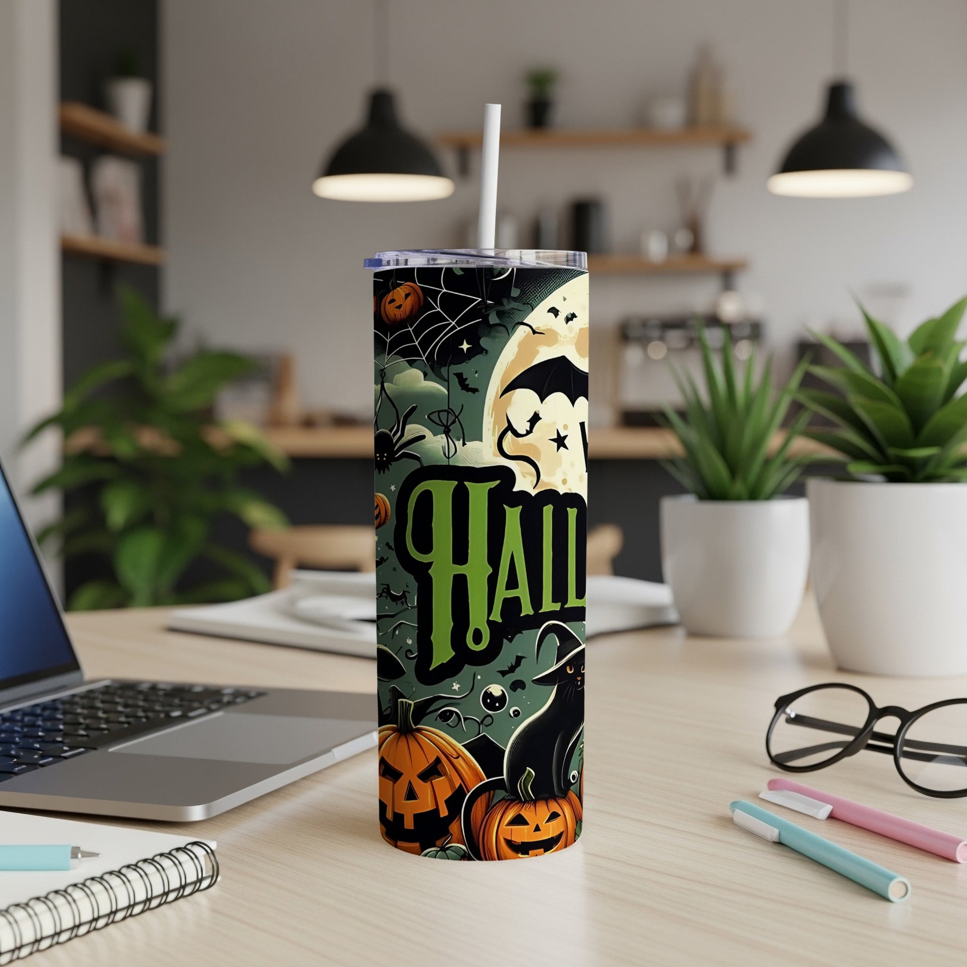 Halloween tumbler with pumpkins, black cat, bats, and moon design.