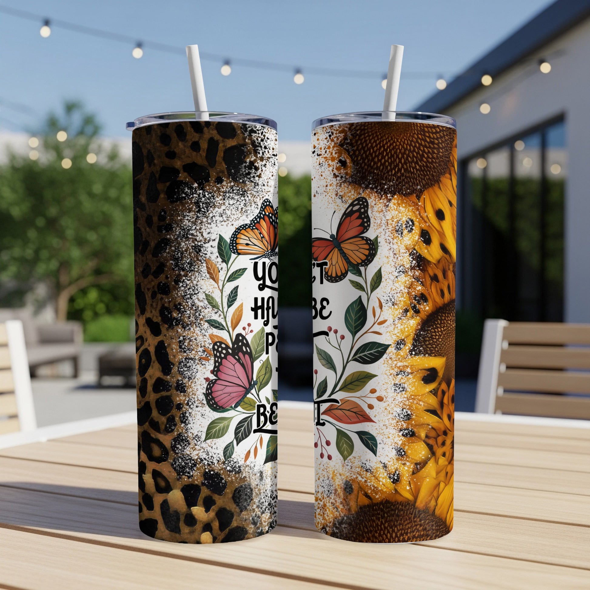 Two tumblers, one with leopard print and butterflies, the other with sunflowers.
