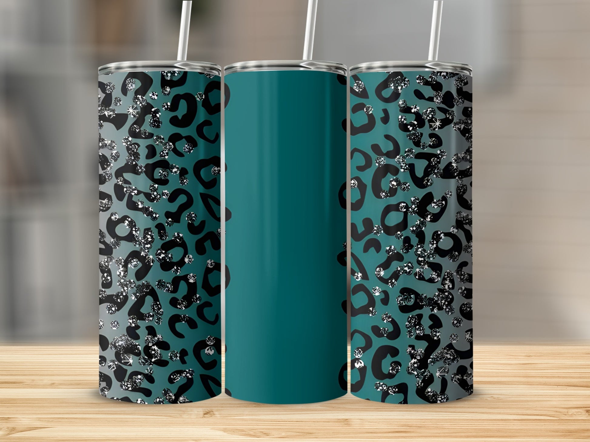 Teal tumbler with black leopard print and silver glitter accents.