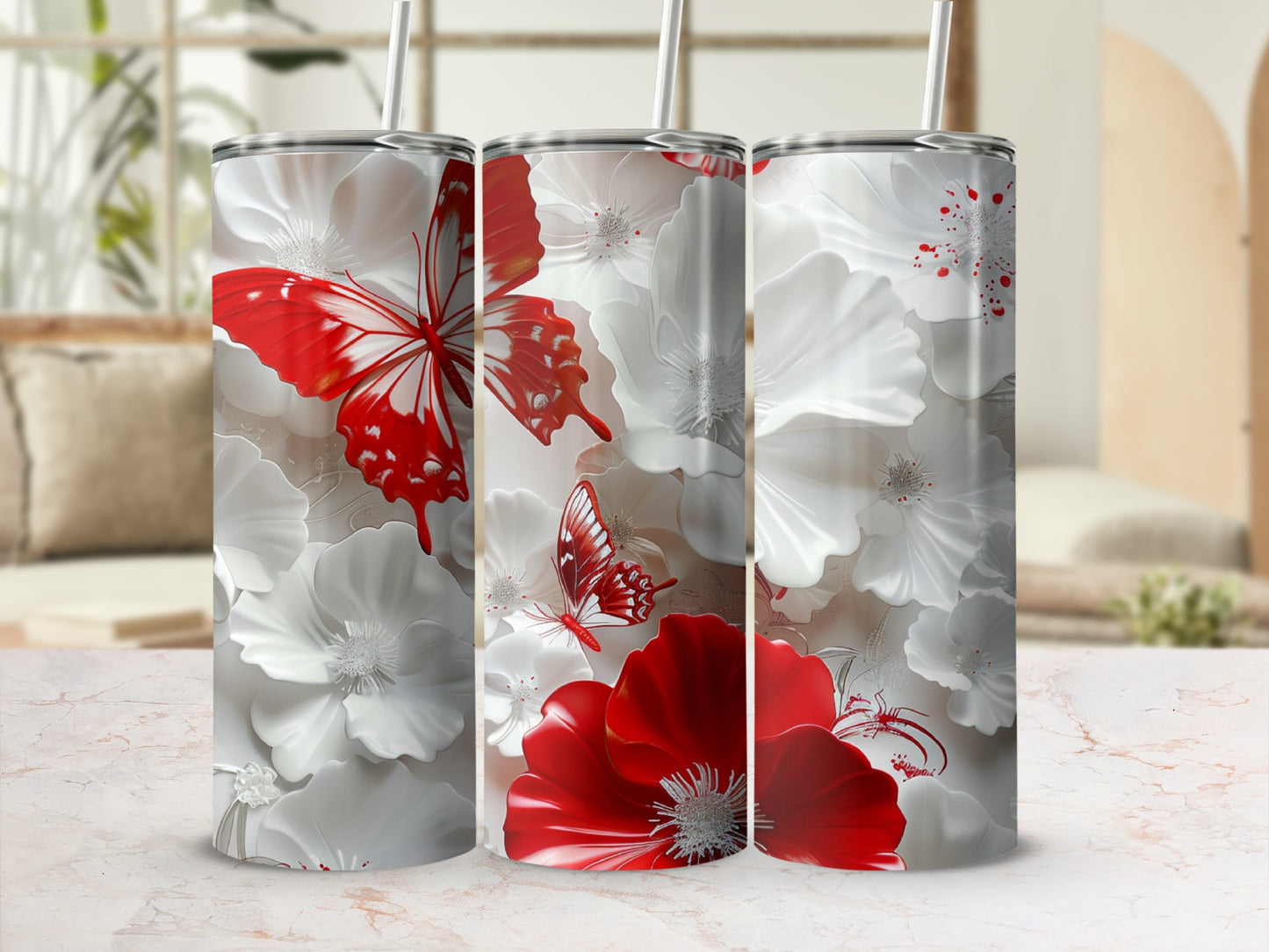 Three tumblers with red butterfly and white floral design.