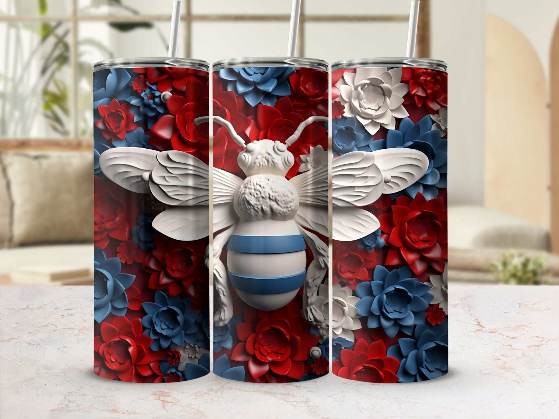 Three tumblers featuring a white bee on a red and blue floral background.