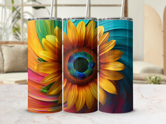 Three tumblers with vibrant, abstract sunflower designs and straws.
