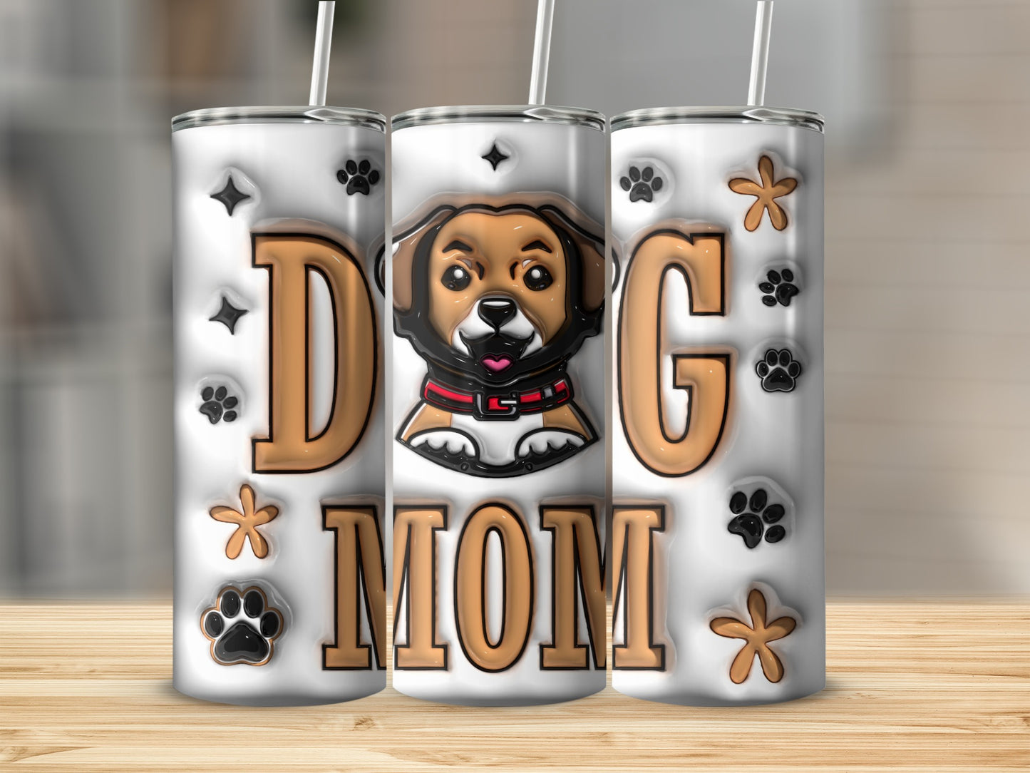 Tumbler with "Dog Mom" text and cartoon dog, paw prints, and stars.