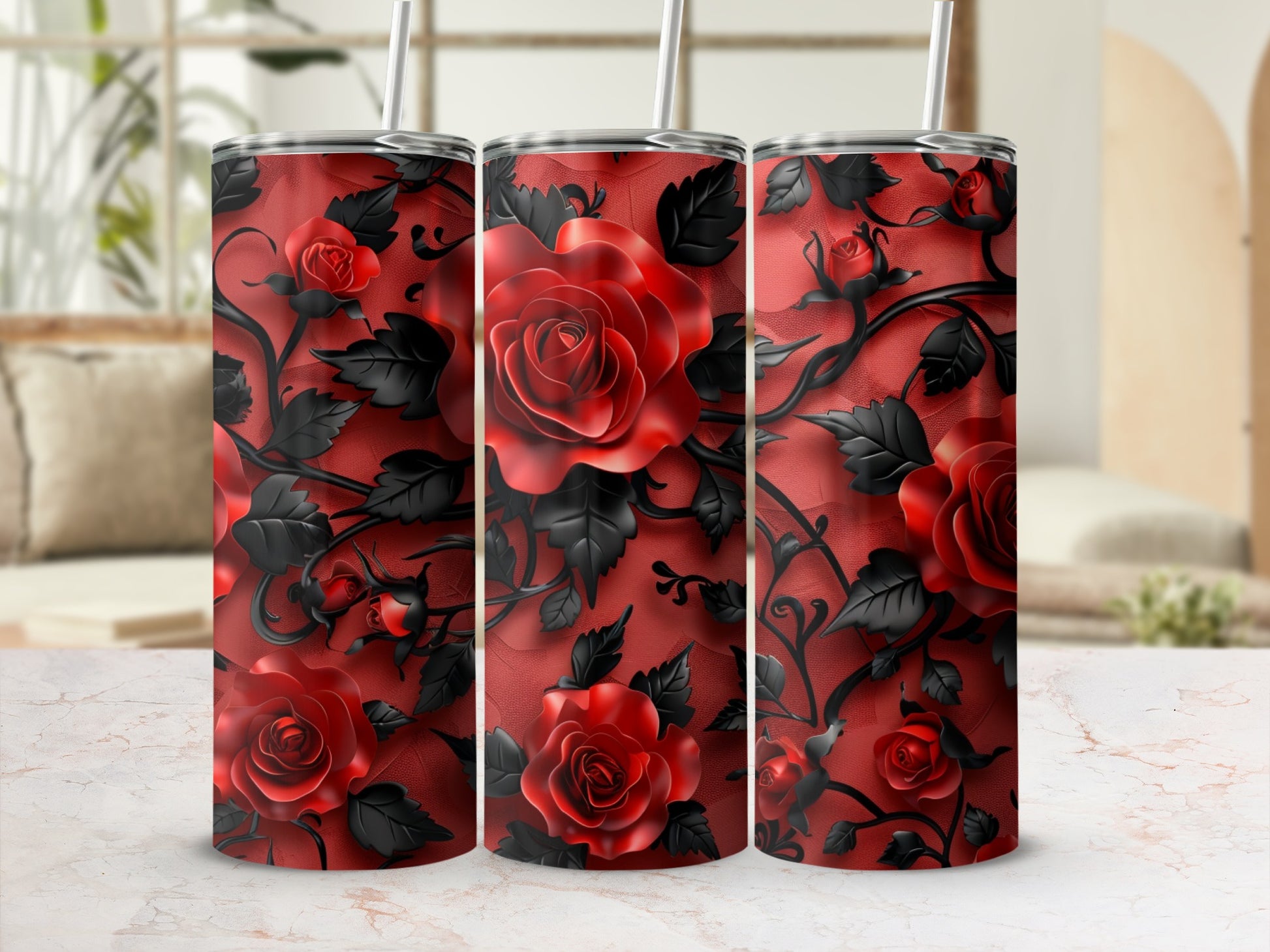 Three tumblers with a red rose and black vine pattern.