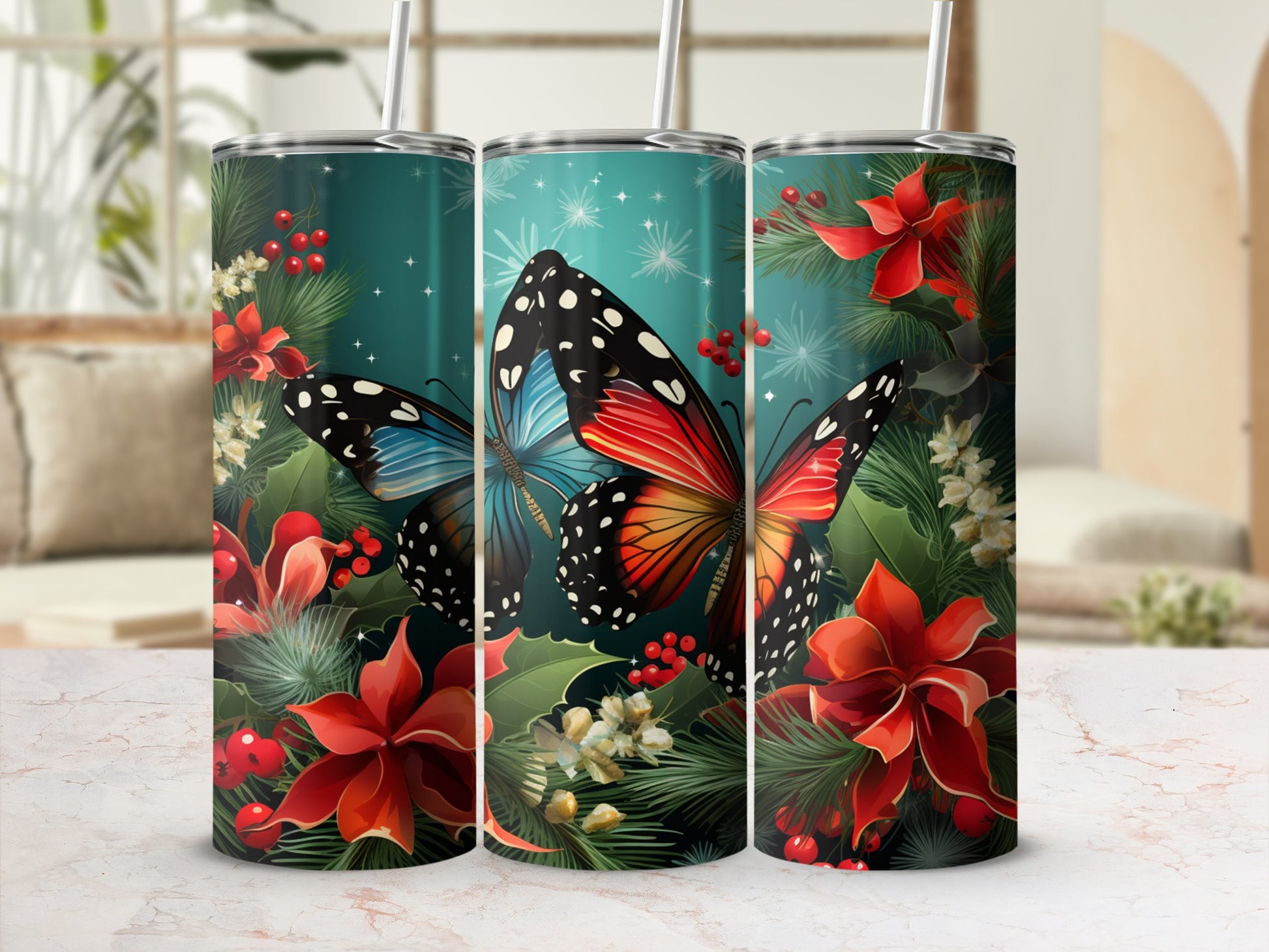 Three tumblers with butterflies and red flowers on a blurred background.