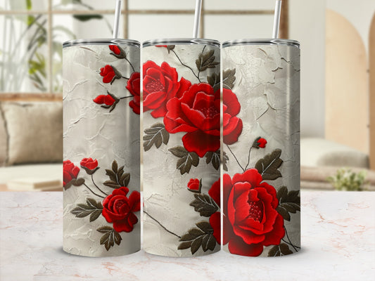 Three tumblers with red roses and textured cream background.