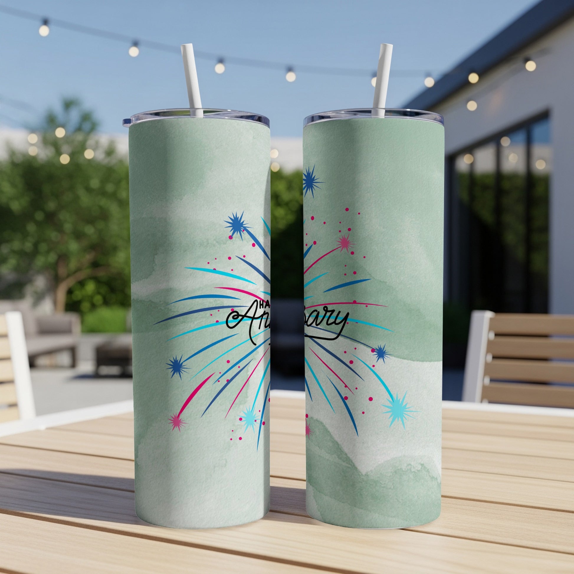 Two tumblers with "Happy Anniversary" and fireworks on a light green watercolor background.