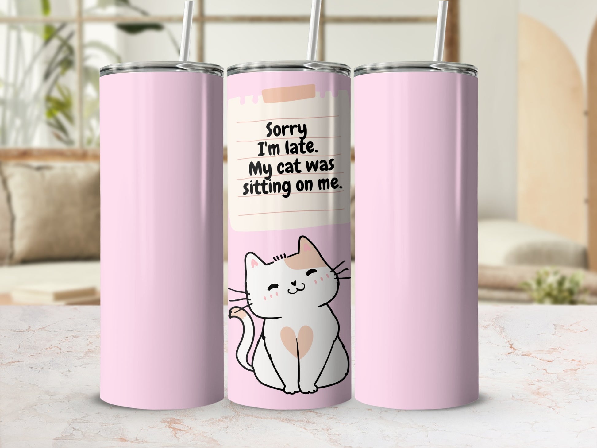 Pink tumbler with cat illustration and text "Sorry I'm late. My cat was sitting on me."