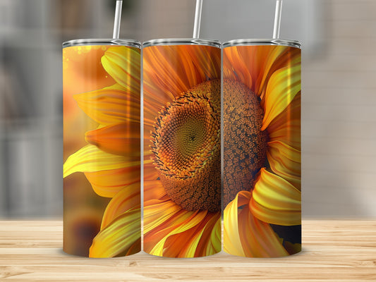 Three tumblers featuring a close-up of a sunflower with vibrant orange petals.