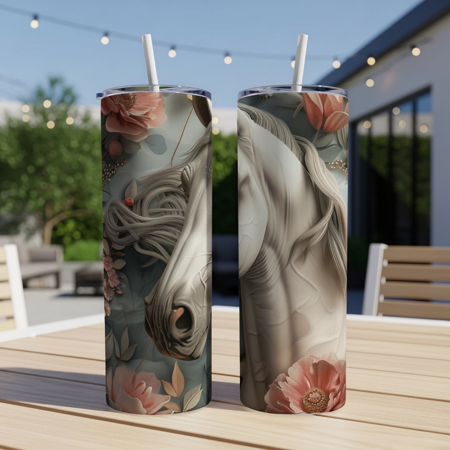 Two white horse tumblers with floral accents on a wooden table.