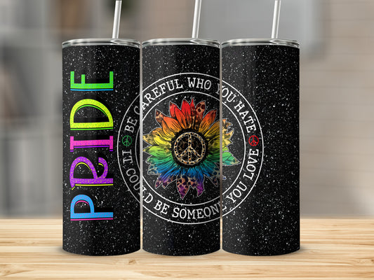 Pride sunflower with peace sign and quote on black speckled tumbler.