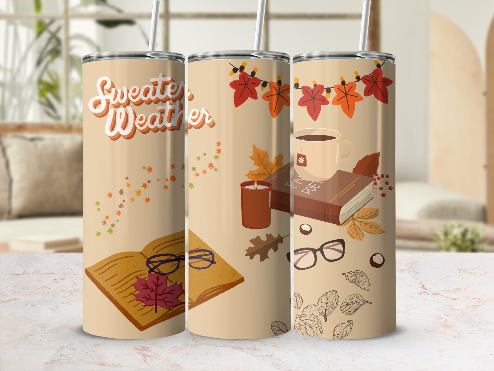 Tan tumbler with "Sweater Weather" and autumn leaves design.