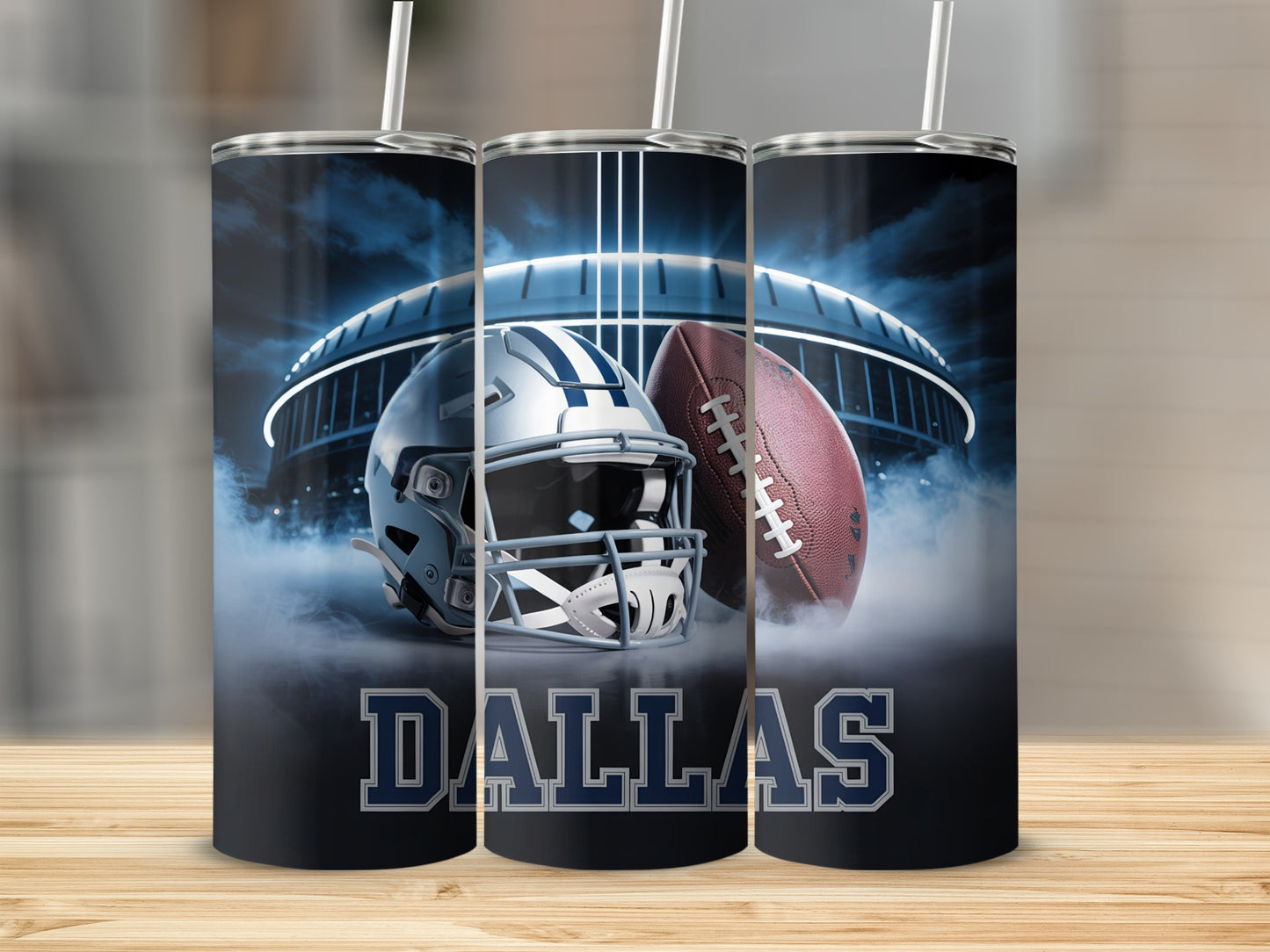 Dallas Cowboys helmet, football, and stadium graphic on three tumblers.