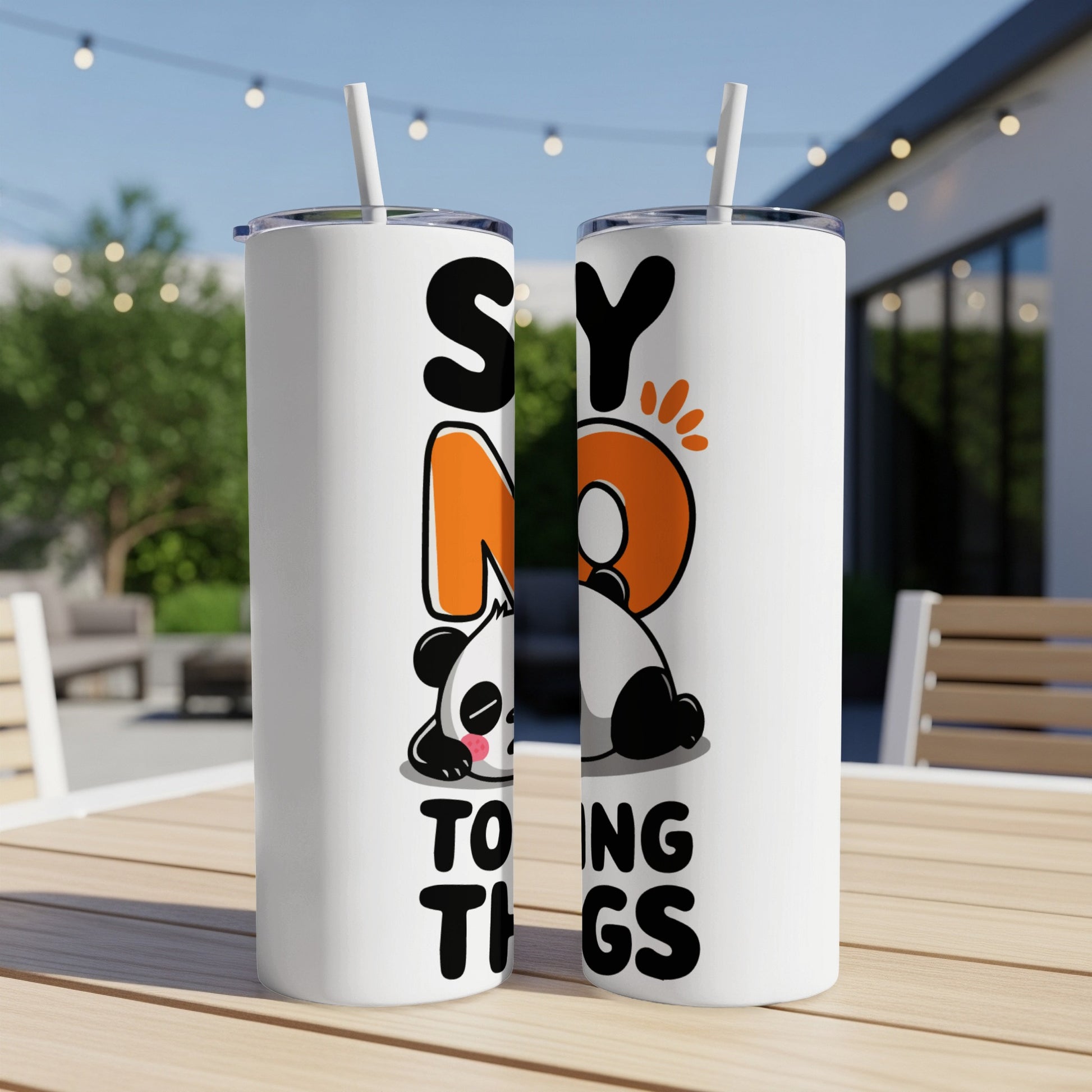 White tumbler with "SY NO TO TH NGS" text and cartoon panda.