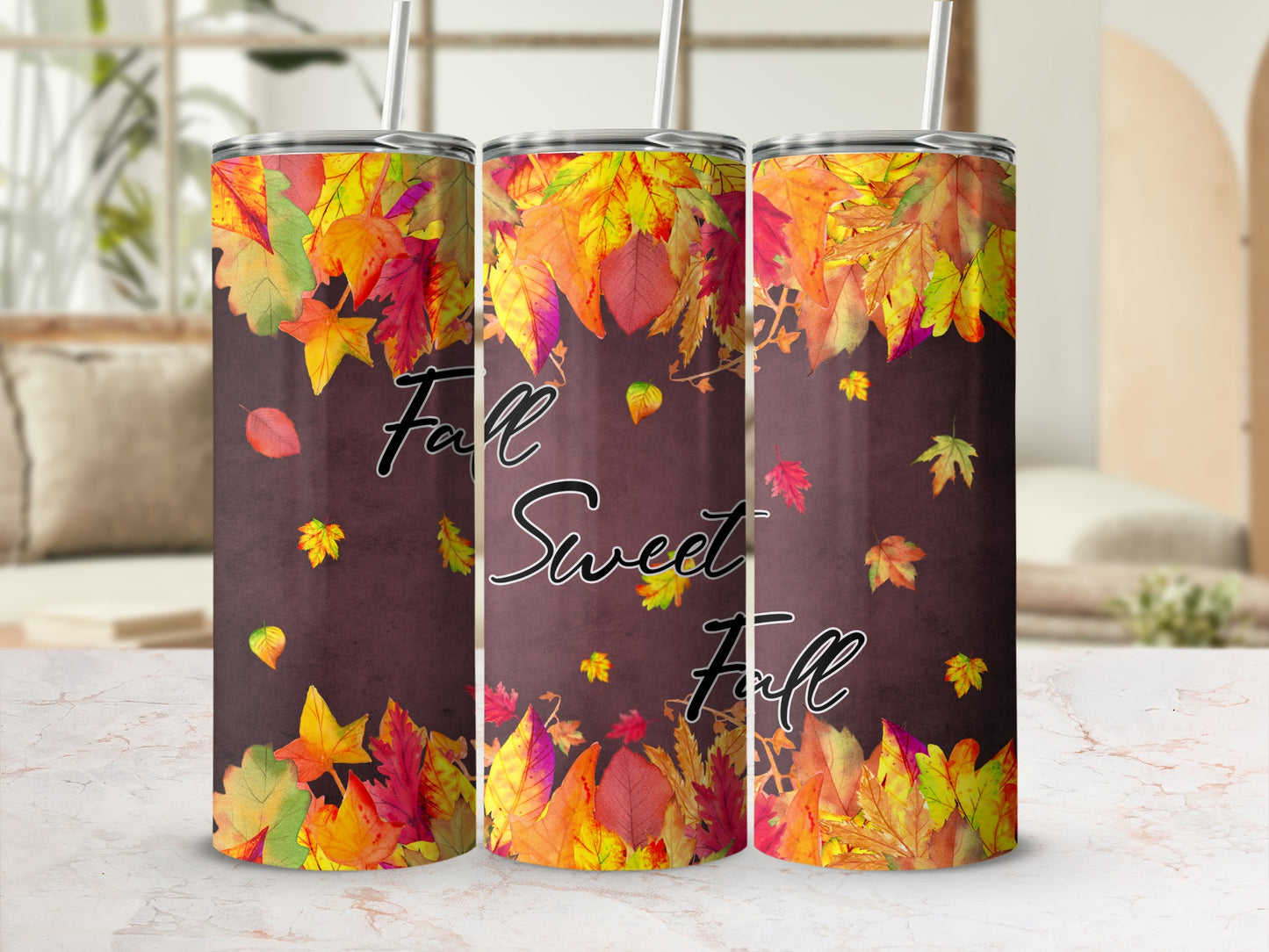 Tumbler with fall leaves and "Fall Sweet Fall" text.