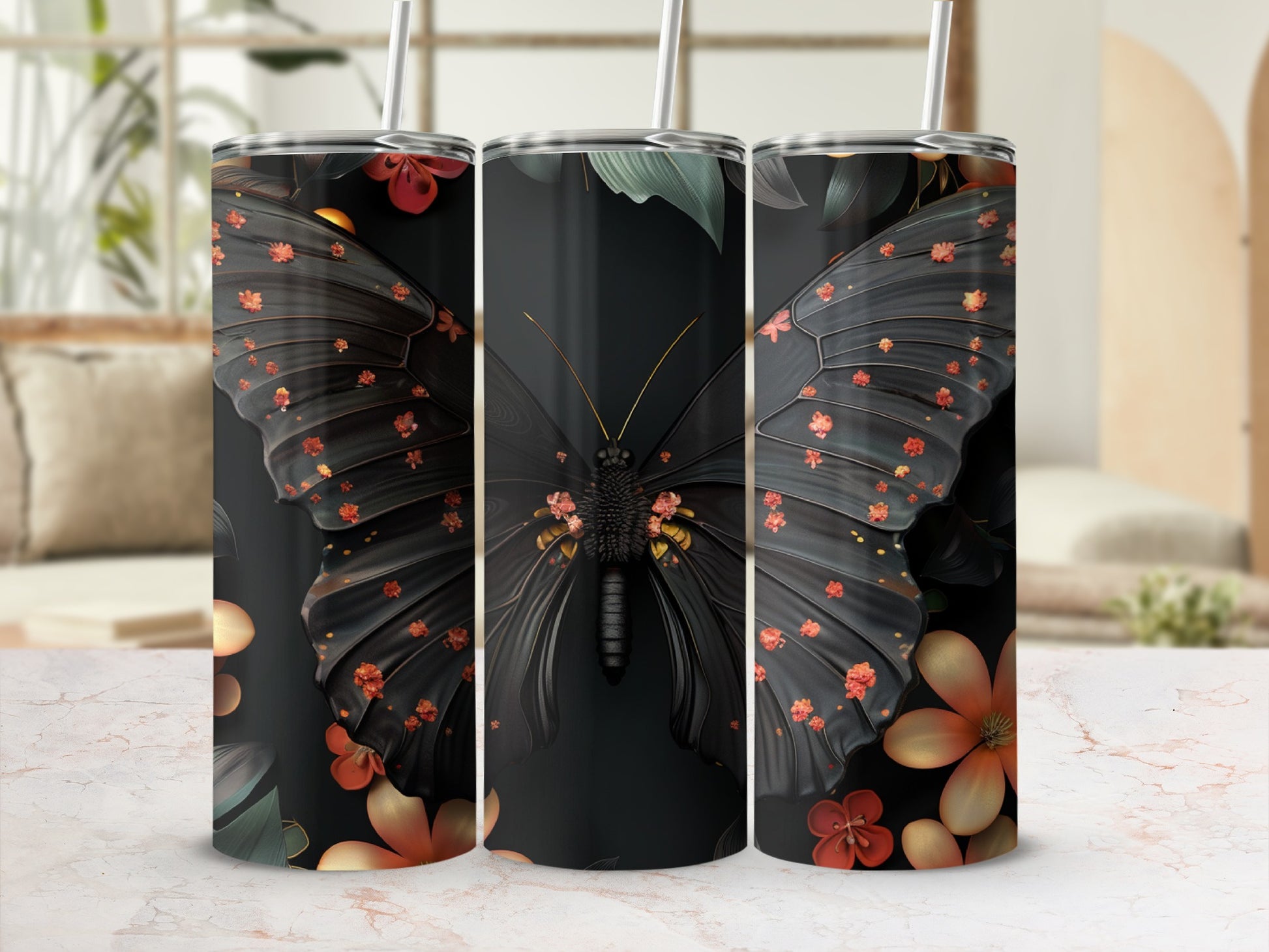 Black butterfly with orange floral accents on a dark tumbler with straw.