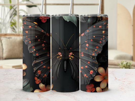 Black butterfly with orange floral accents on a dark tumbler with straw.