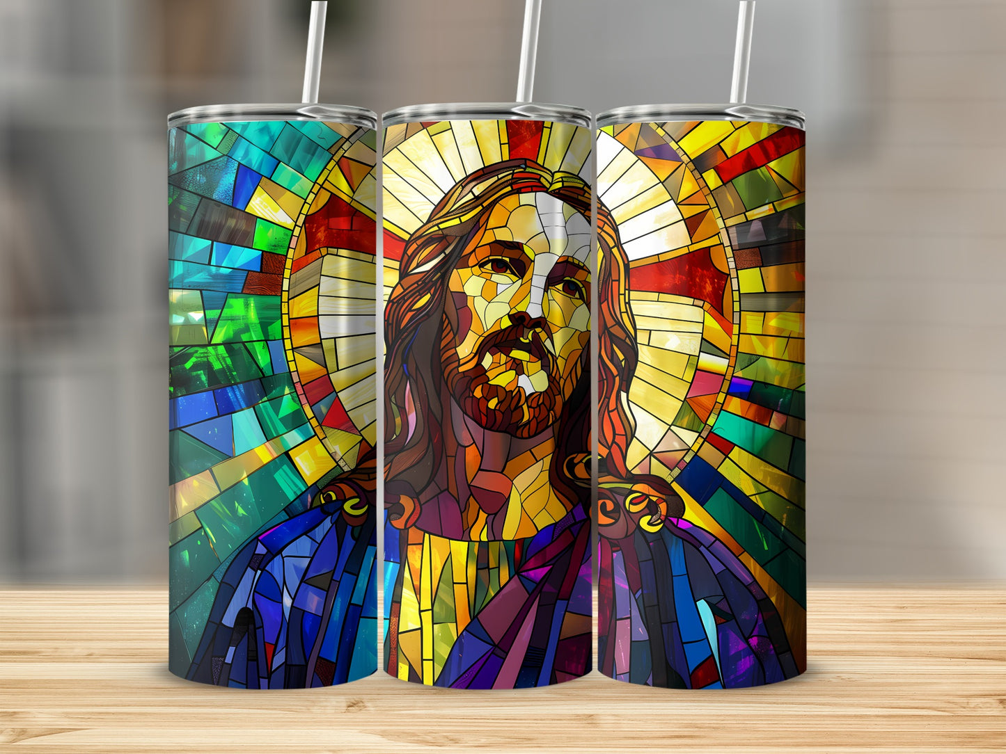 Jesus stained glass art on three tumblers with straws.