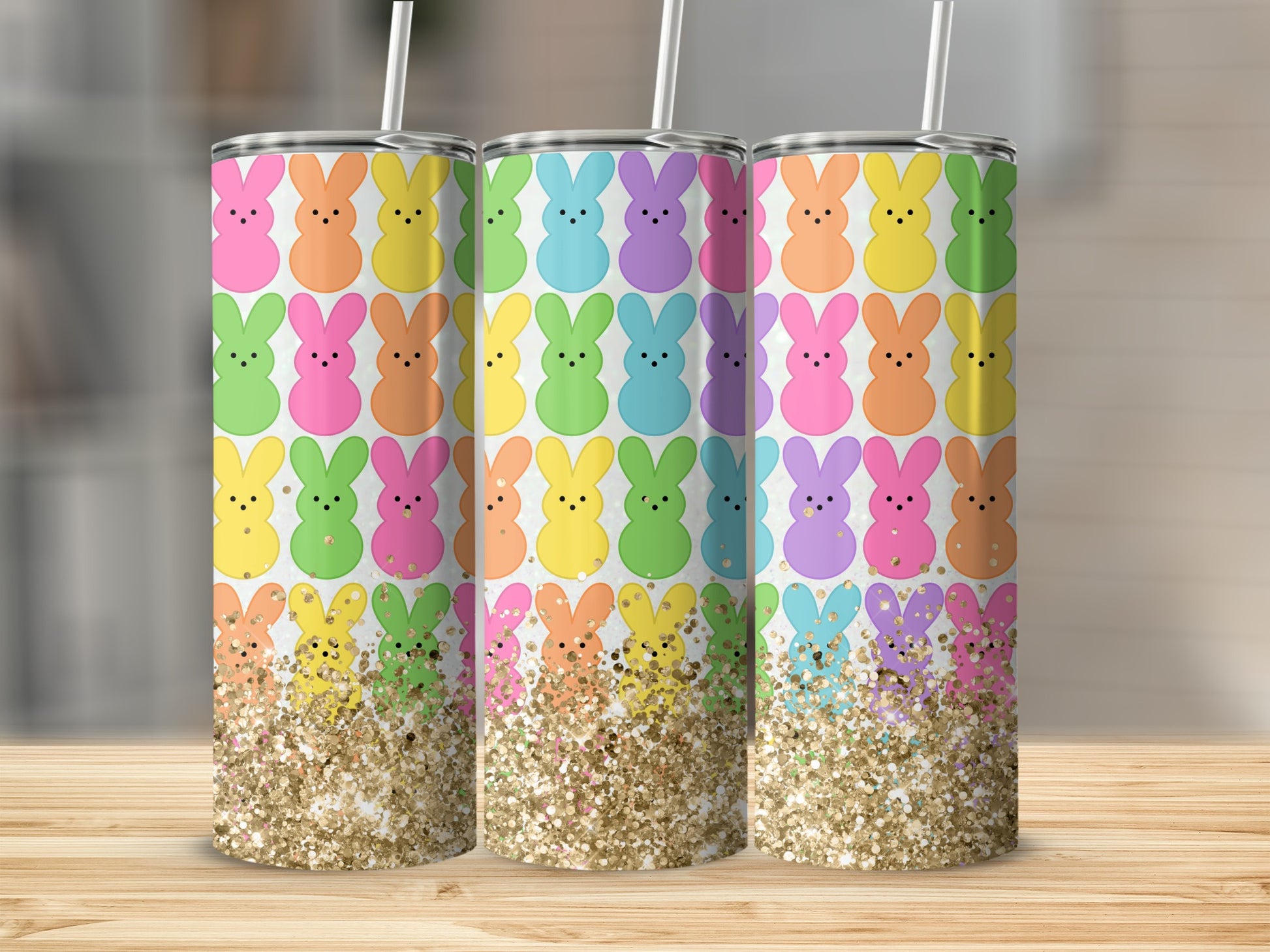 Three Peeps bunnies tumblers with glitter and pastel patterns.