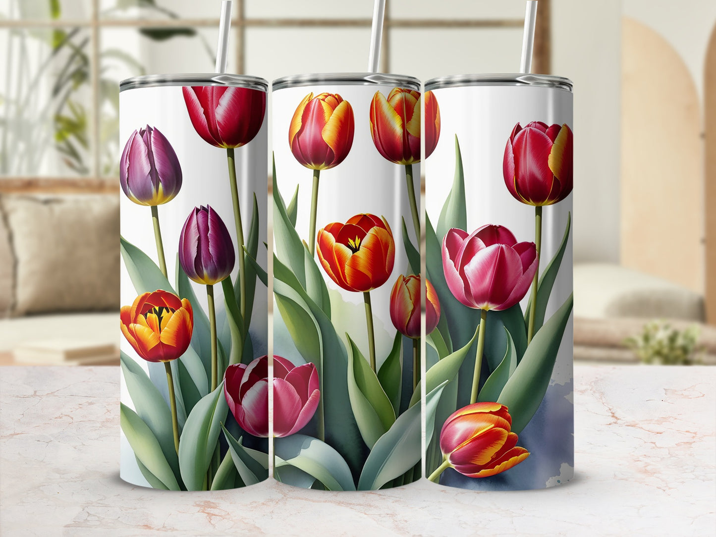 White tumblers decorated with a watercolor pattern of red, orange, and purple tulips.