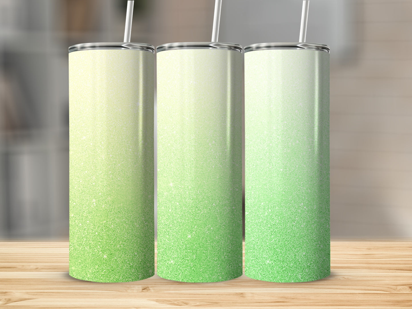 Three gradient tumblers with a glitter effect.