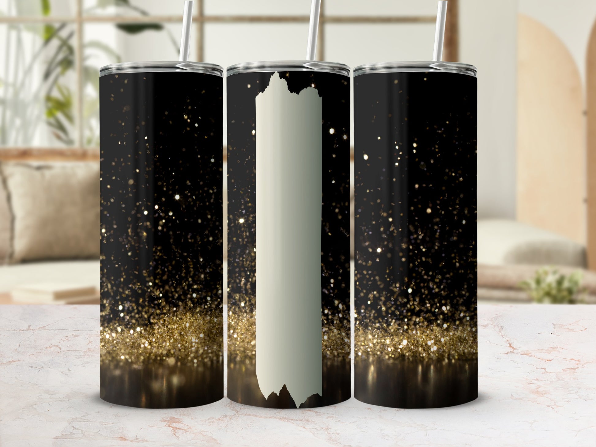 Three black tumblers with gold glitter and a white vertical stripe.