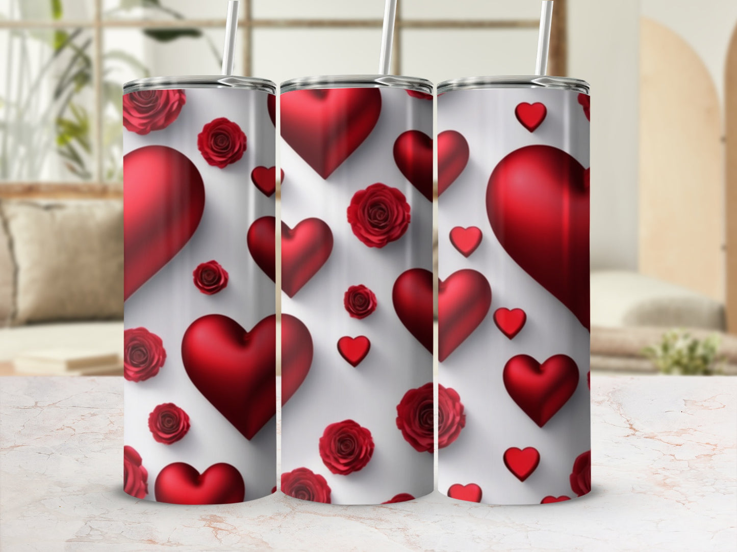 Three heart-patterned tumblers with roses and heart designs.