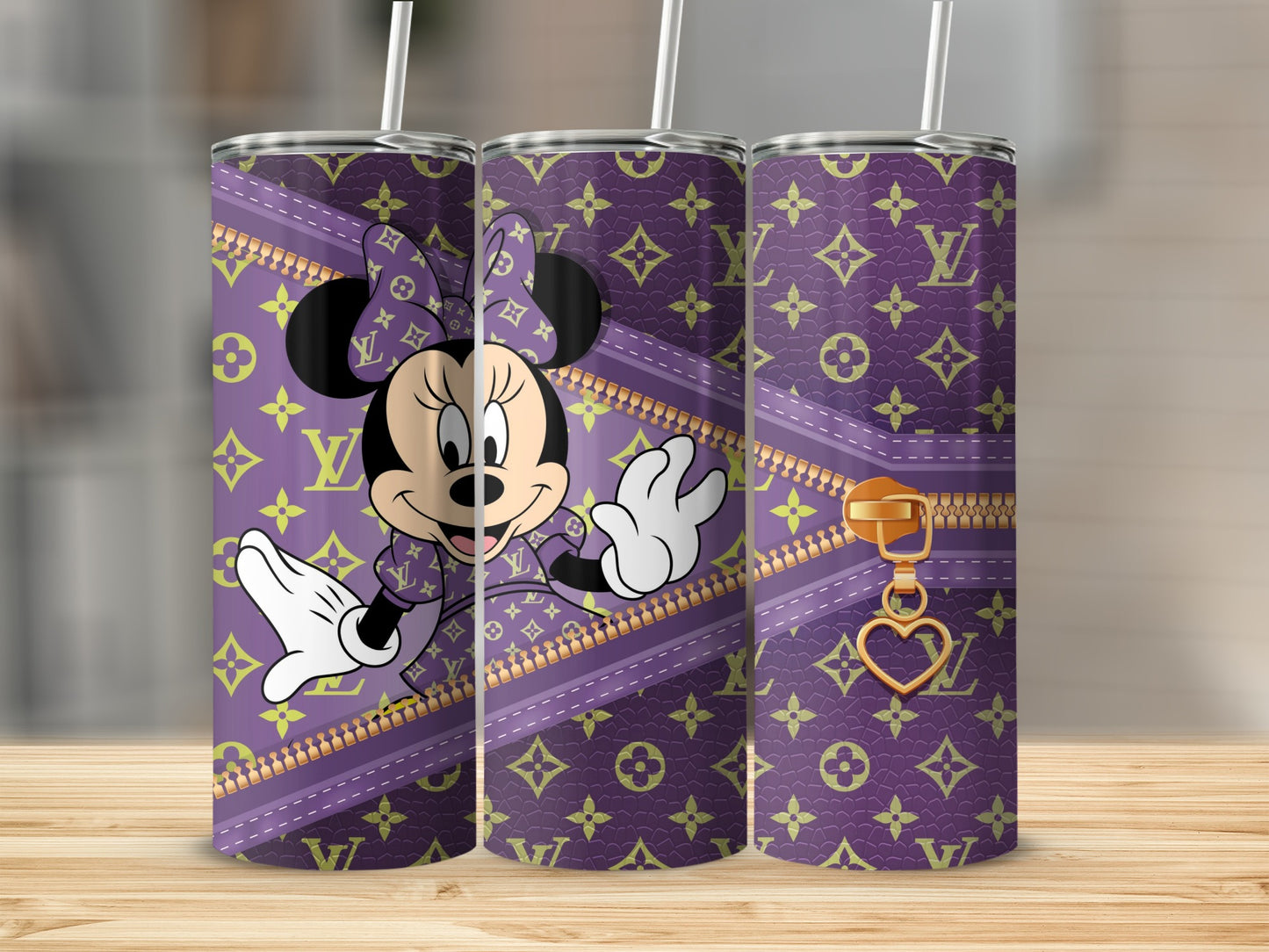 Minnie Mouse on purple tumbler with monogrammed pattern and zipper detail.