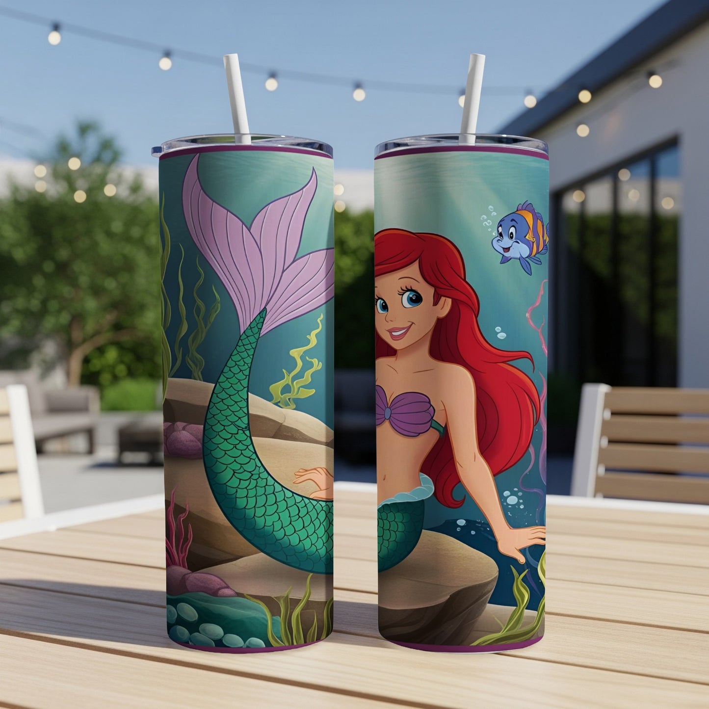 Ariel the mermaid on a tumbler, with Flounder swimming nearby.