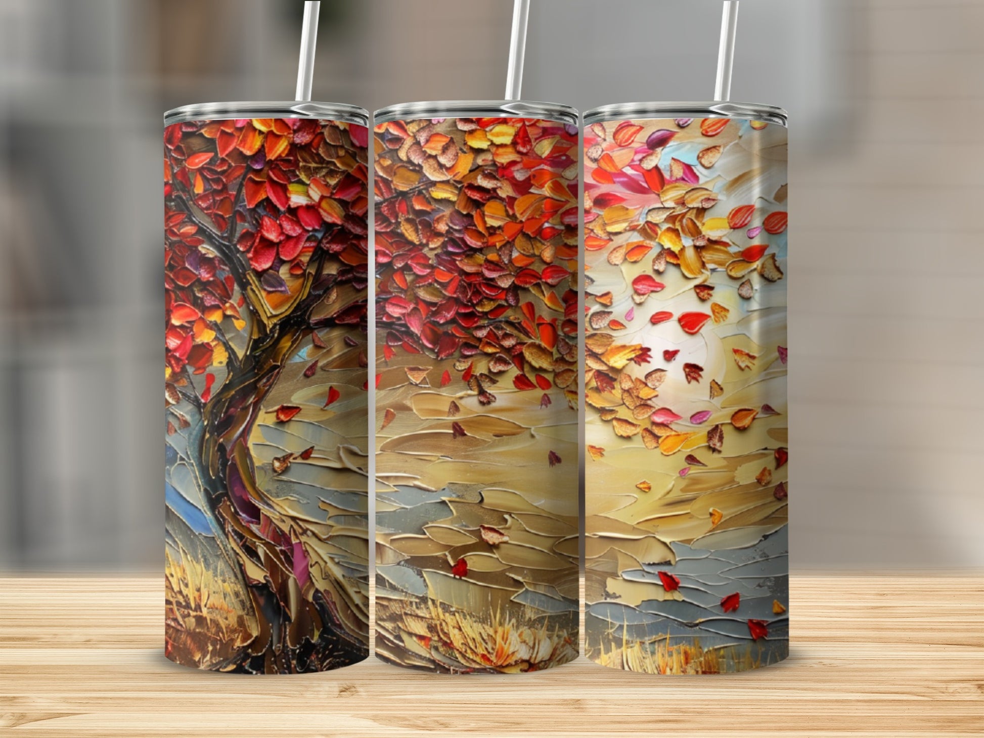 Three tumblers with a textured, impressionistic autumn tree and falling leaves design.