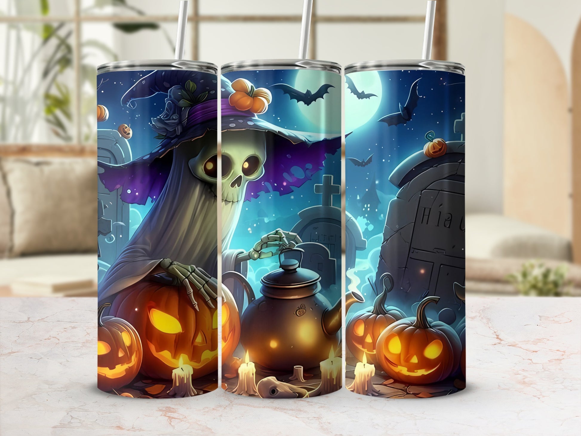 Halloween themed tumblers with skeleton ghost, pumpkins, kettle, and bats.