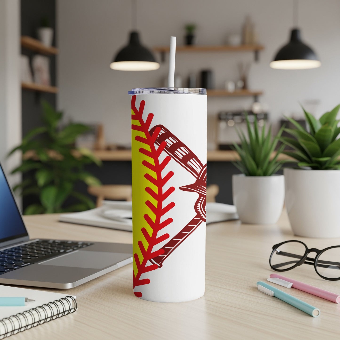 White tumbler with a softball bat and ball graphic.