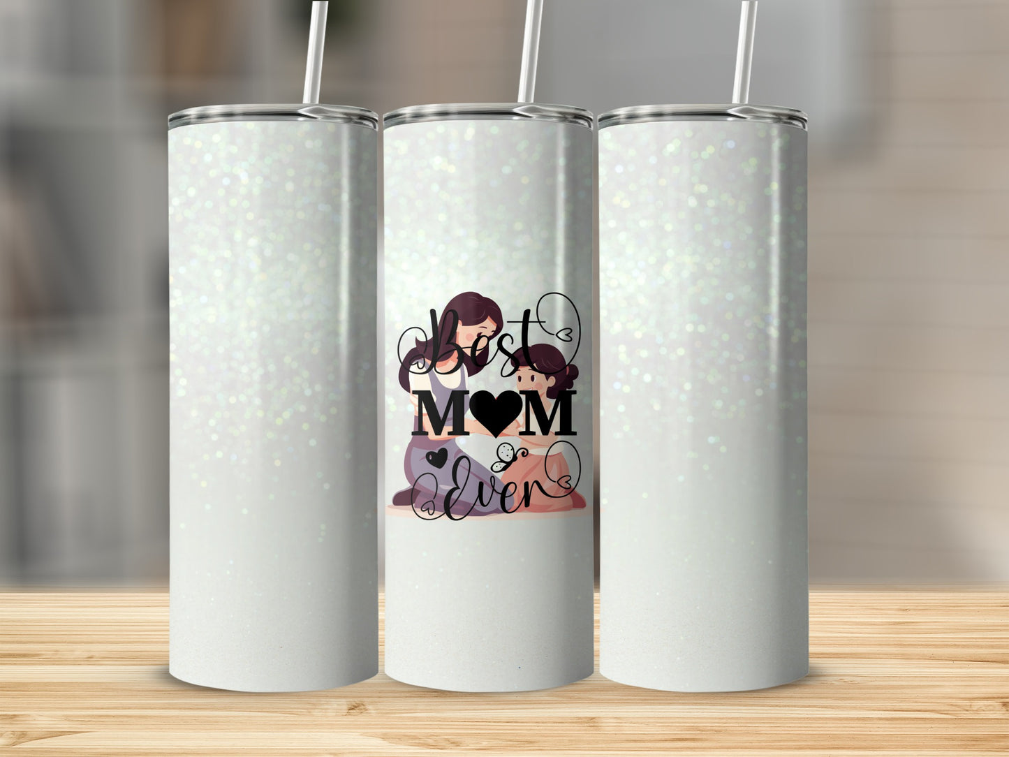 White glitter tumbler with "Best Mom Ever" text and mother and child graphic.