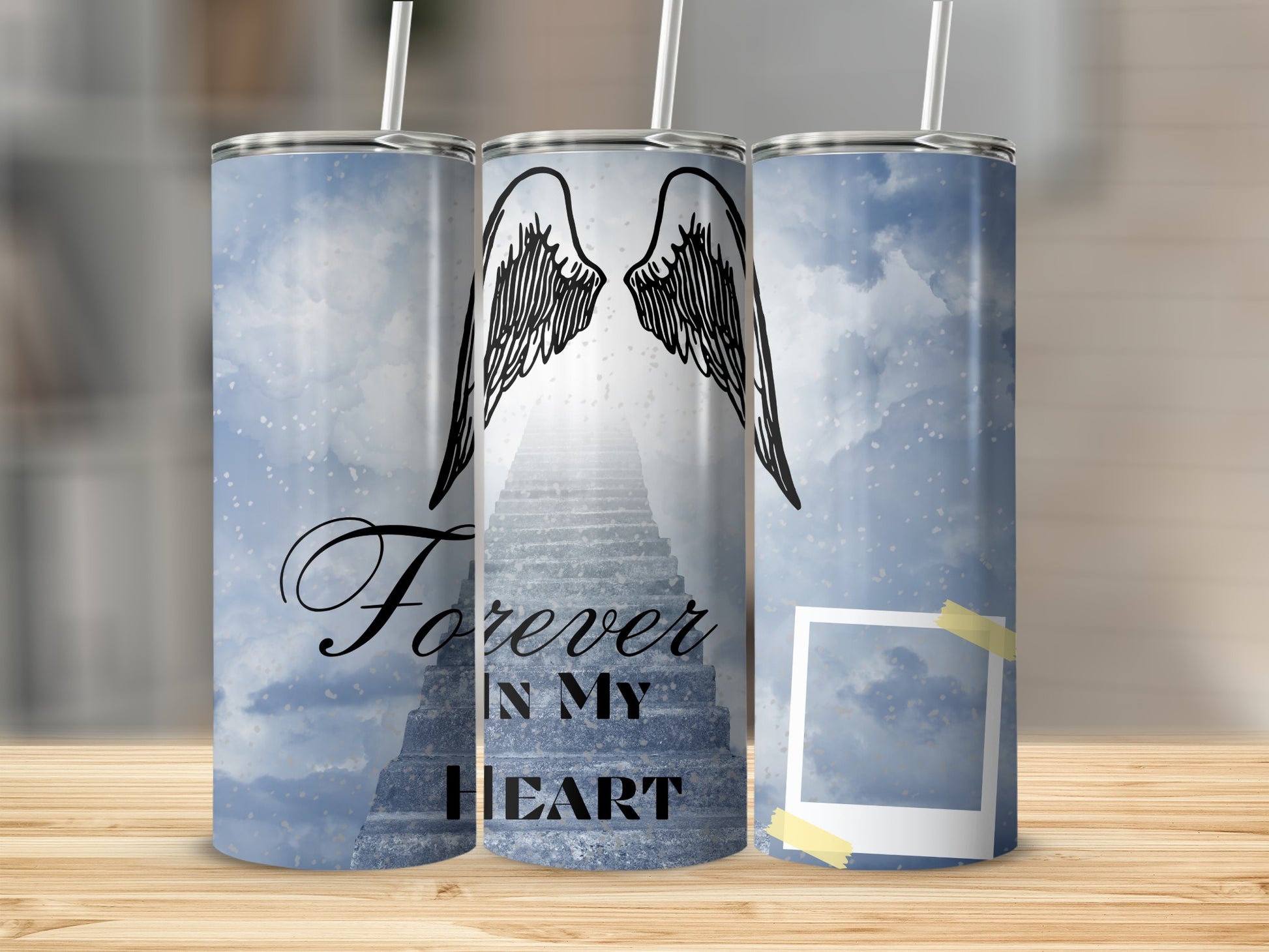Tumbler with angel wings, a stairway to heaven, and text "Forever In My Heart."